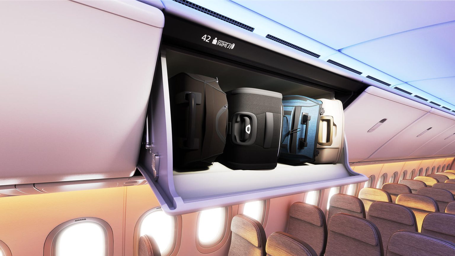 777X economy cabin bin open with luggage inside