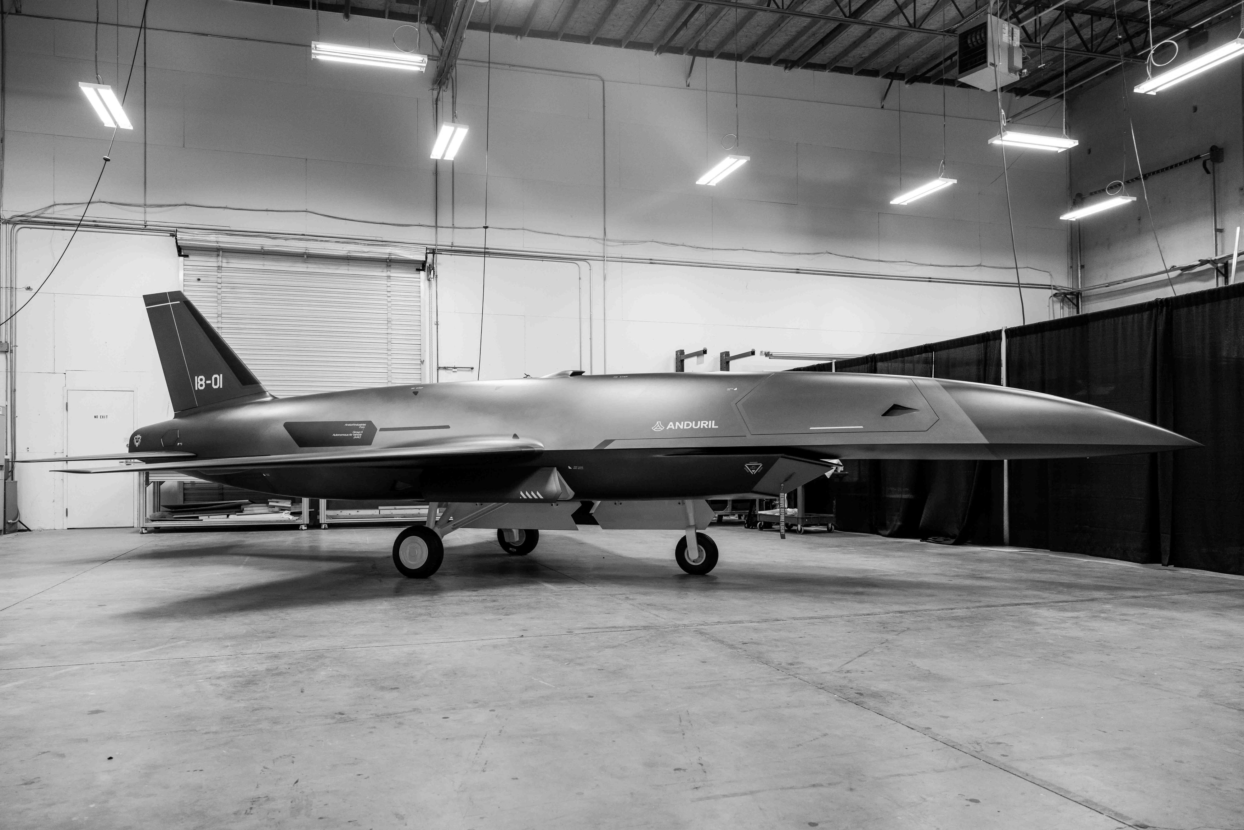 Anduril Fury aircraft mockup in a warehouse
