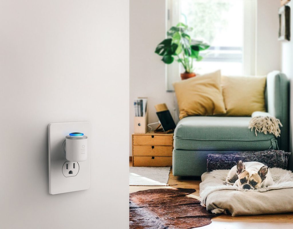 Amazon Alexa Filo component plugged into an outlet inside a modern home