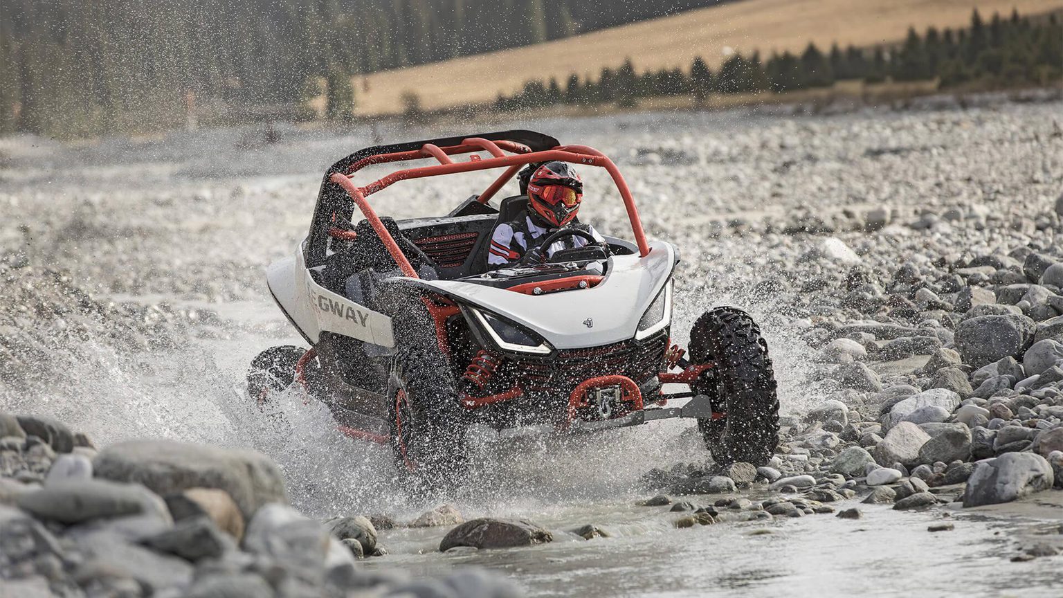 Segway ATV on rocky creek