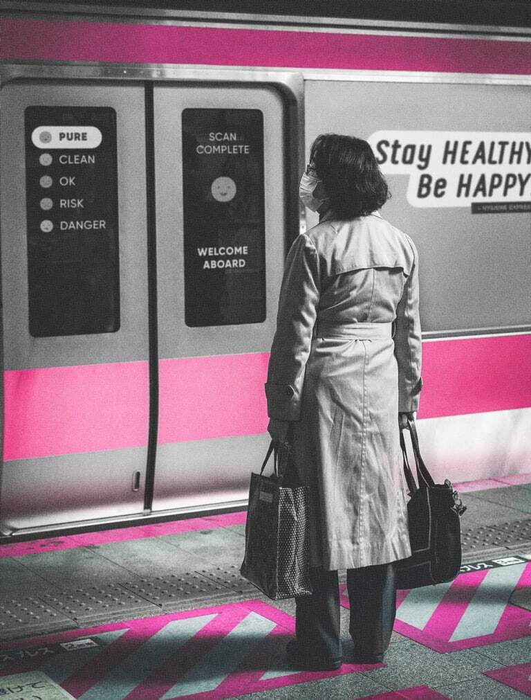 Woman standing in front of subway doors