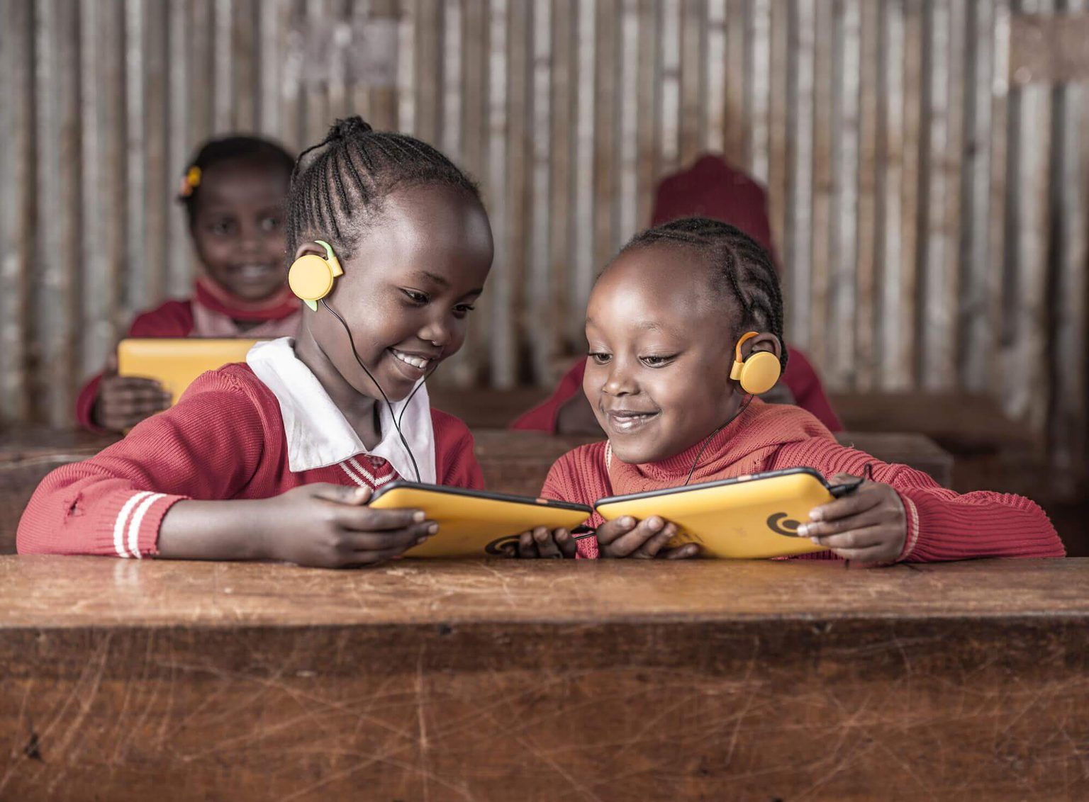 Children at school using Kio Kit tablets to learn